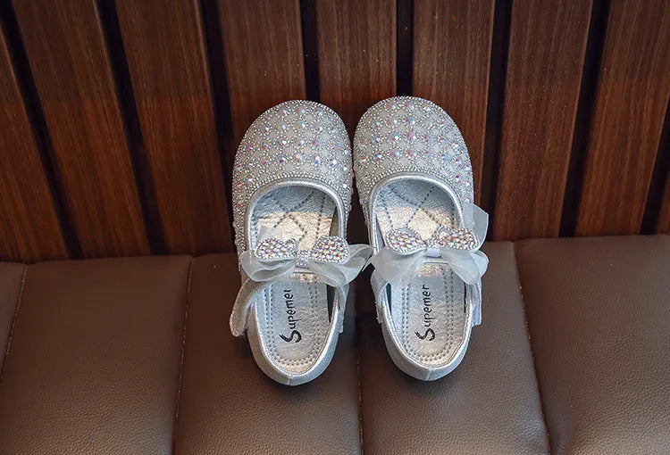 Zapatos de lazo brillante para niños