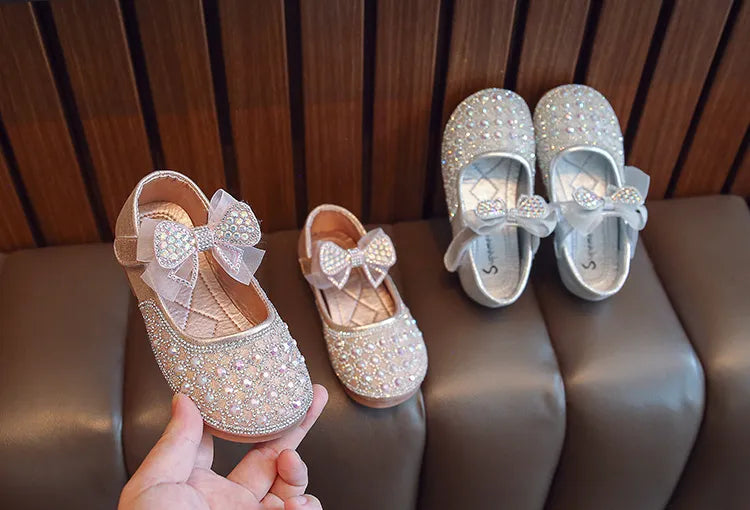 Zapatos de lazo brillante para niños