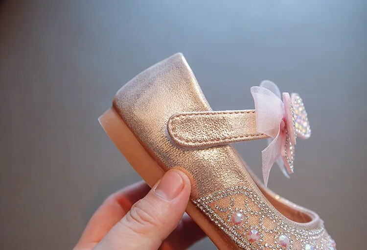 Zapatos de lazo brillante para niños