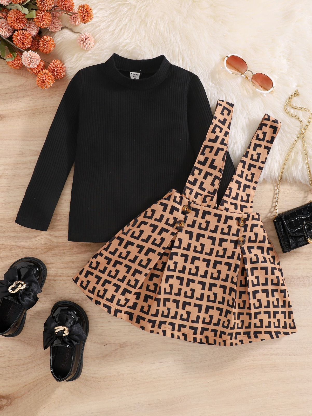 Conjunto infantil con blusa negra