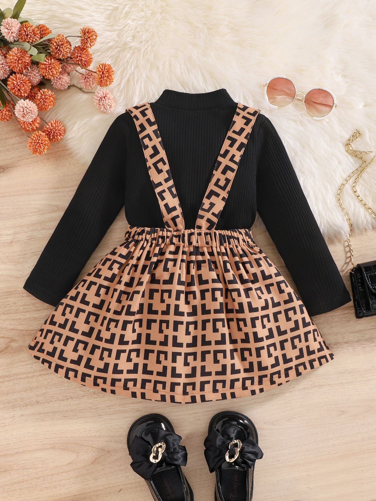 Conjunto infantil con blusa negra