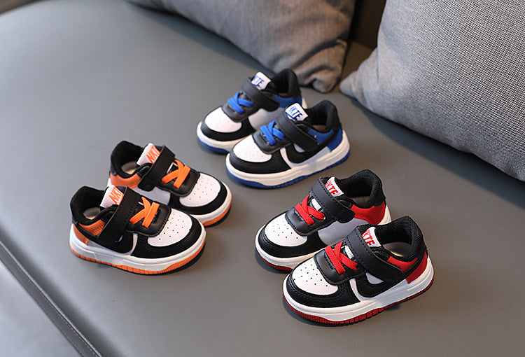 Zapatillas deportivas para niños NK en tres colores