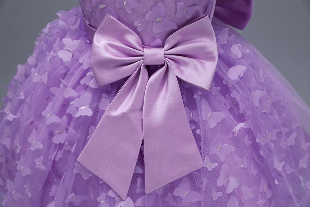 Vestido infantil con mariposas y lazo
