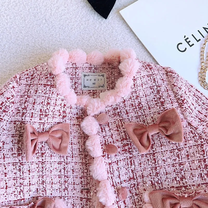 Conjunto de abrigo infantil con lazos