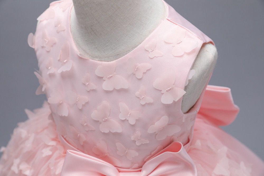 Vestido infantil con mariposas y lazo