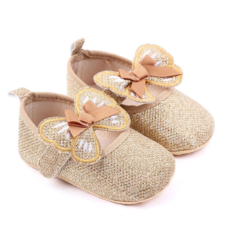 Zapatos planos con lazo de mariposa