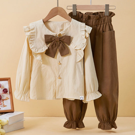 Conjunto infantil con lazo marrón