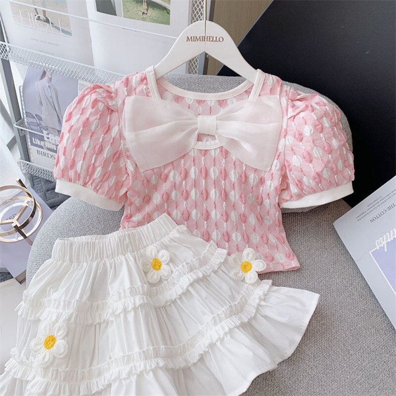 Conjunto infantil de lazo y flores