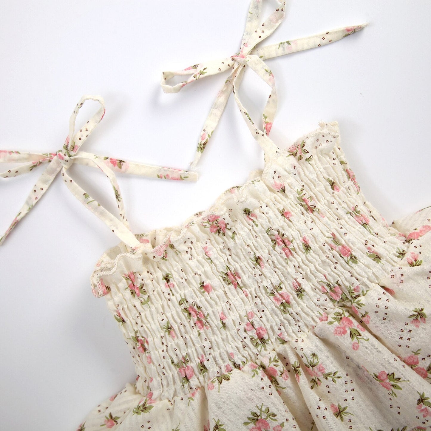 Body infantil con volantes y flores