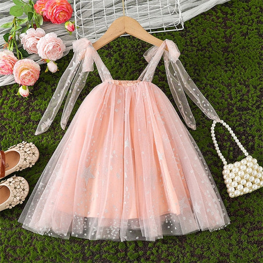 Vestido infantil con tirantes y lazo de tul