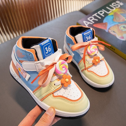 Zapatillas deportivas para niños con piruleta