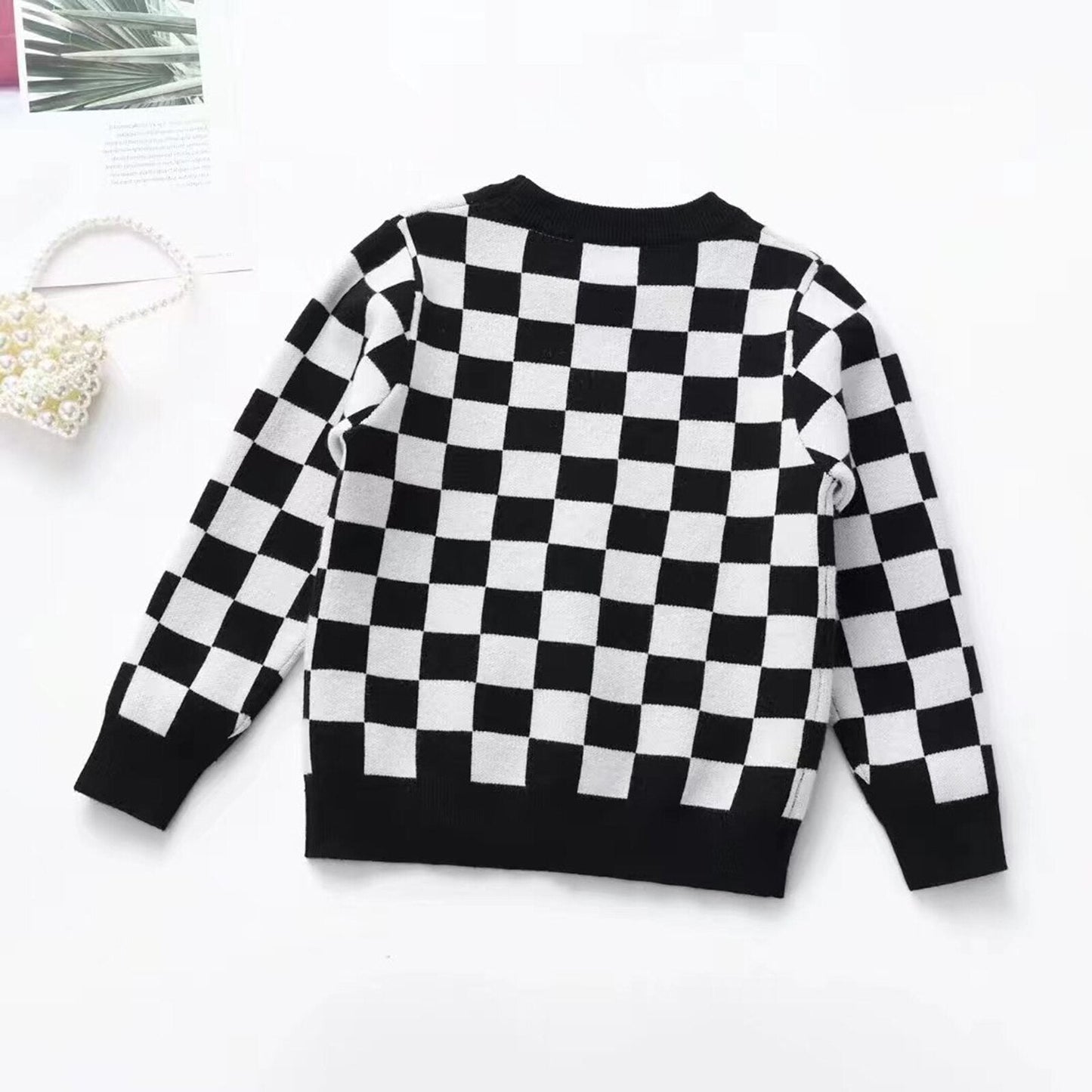 Blusa infantil con estampado de tablero de ajedrez