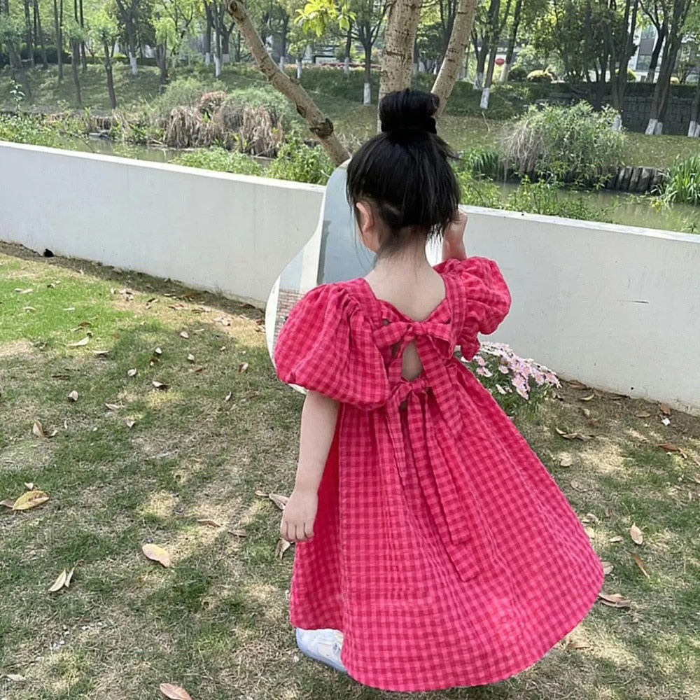 Vestido elegante con lazo