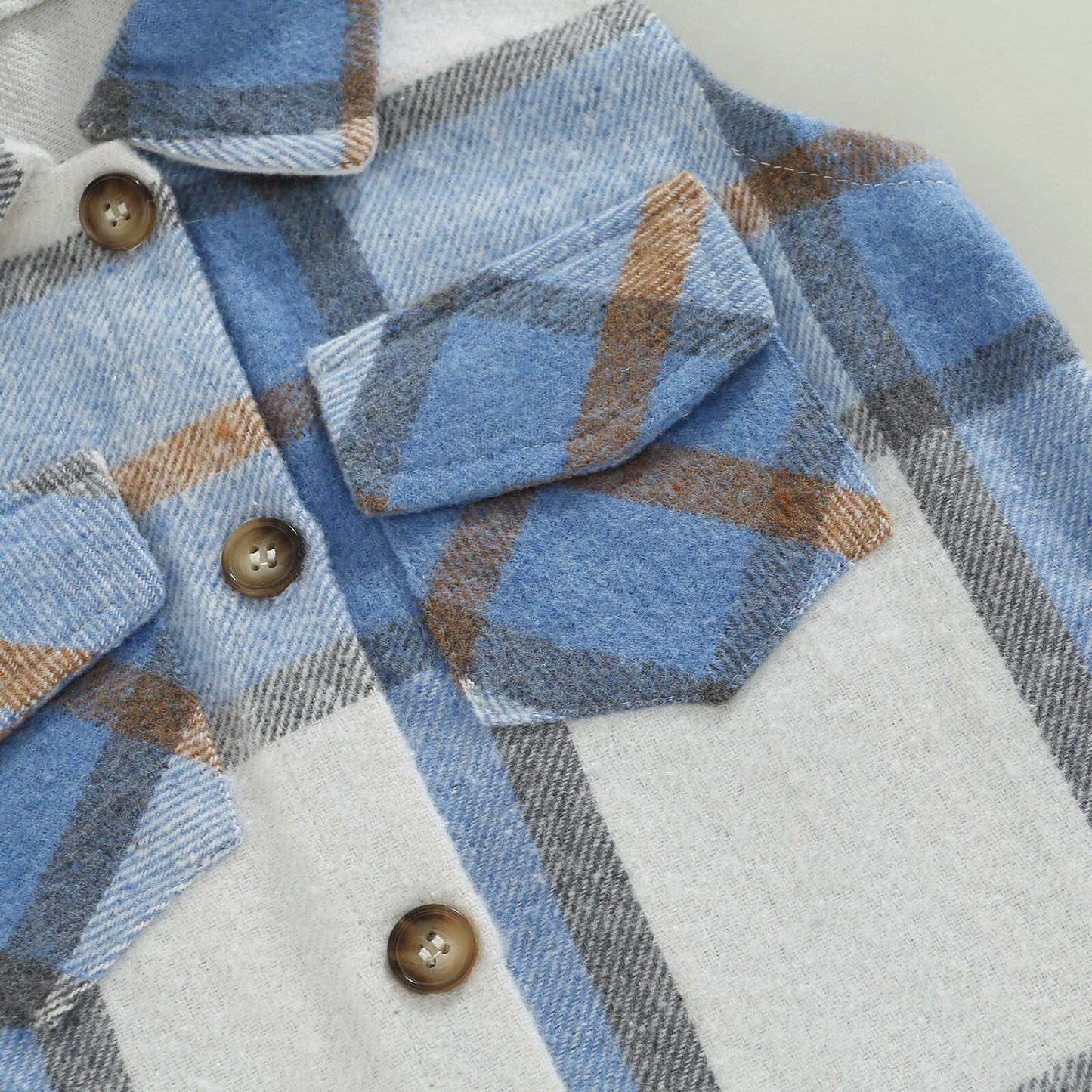 Blusa de ajedrez con capucha marrón y azul