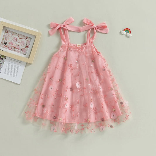 Vestido infantil con tirantes y lazo de tul