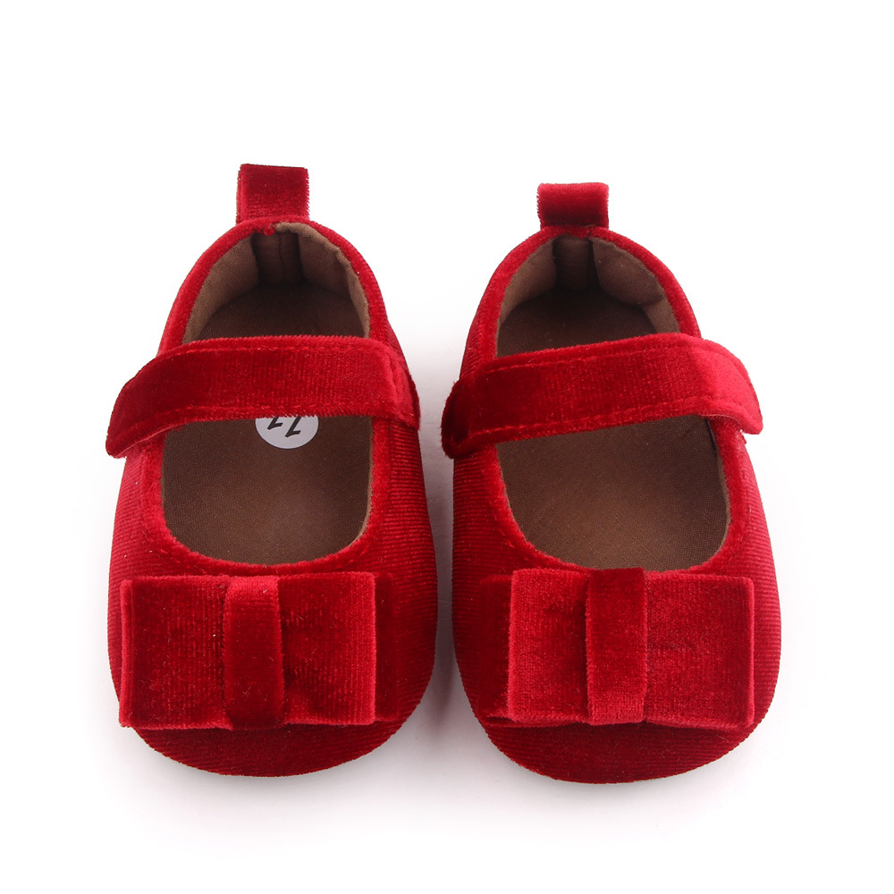 Zapato de bebé con lazo