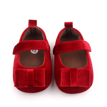 Zapato de bebé con lazo