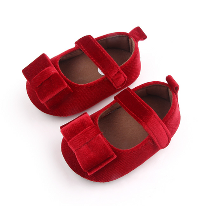 Zapato de bebé con lazo
