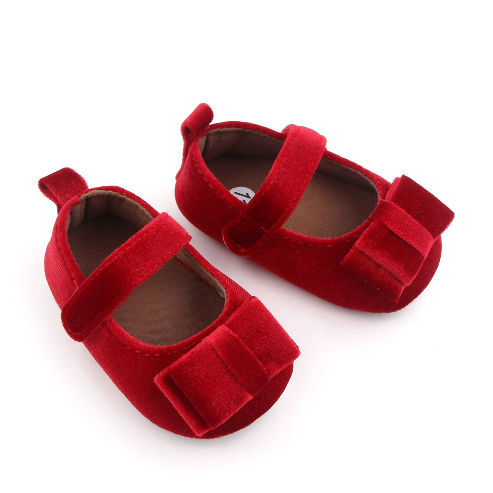 Zapato de bebé con lazo