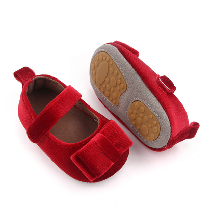 Zapato de bebé con lazo