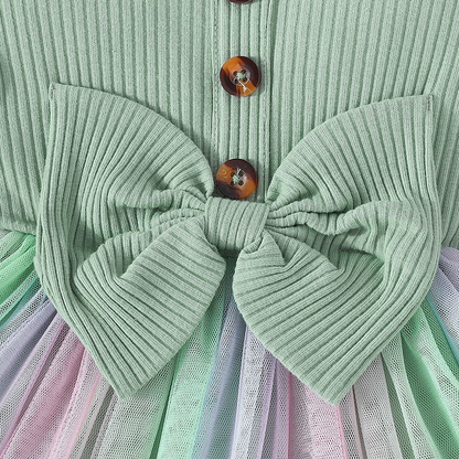 Vestido infantil con lazo y falda colorida