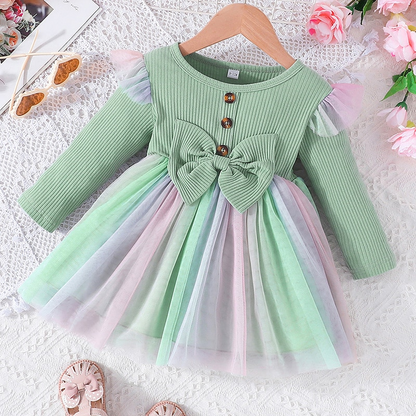 Vestido infantil con lazo y falda colorida