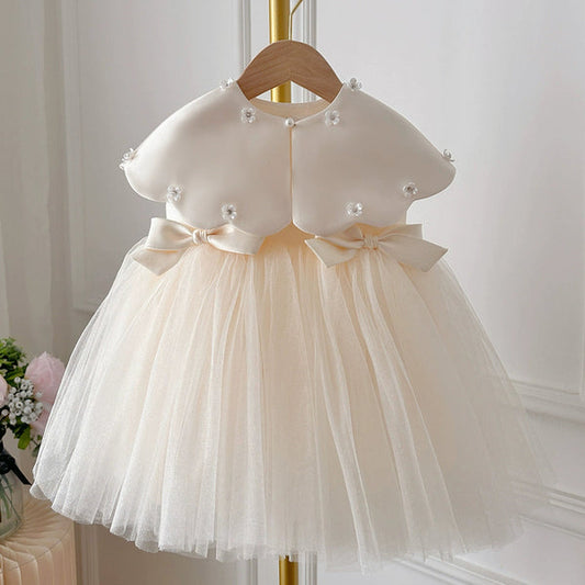Vestido de fiesta infantil con lazos y flores 