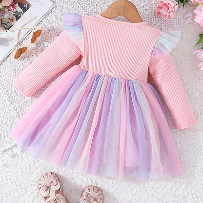 Vestido infantil con lazo y falda colorida