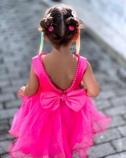 Vestido de fiesta infantil con lazo rosa 