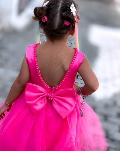 Vestido de fiesta infantil con lazo rosa 