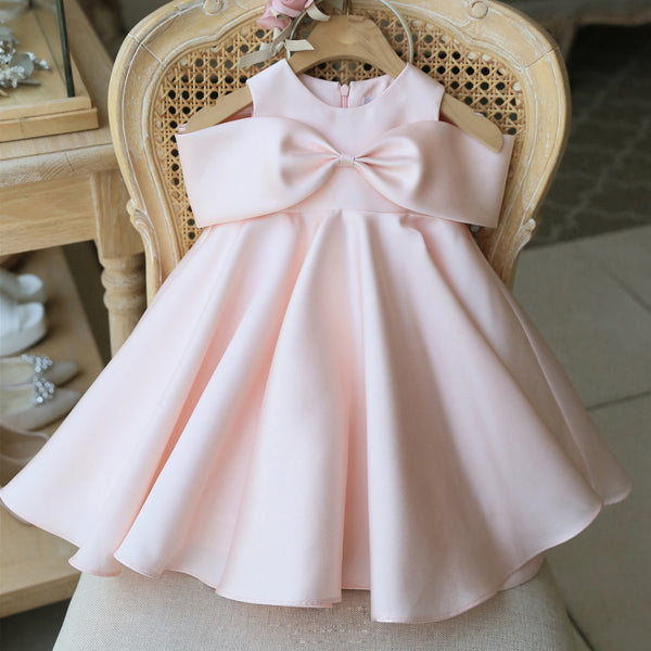 Vestido infantil con lazo rosa 