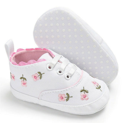 Zapatillas de bebé niña con flores bordadas