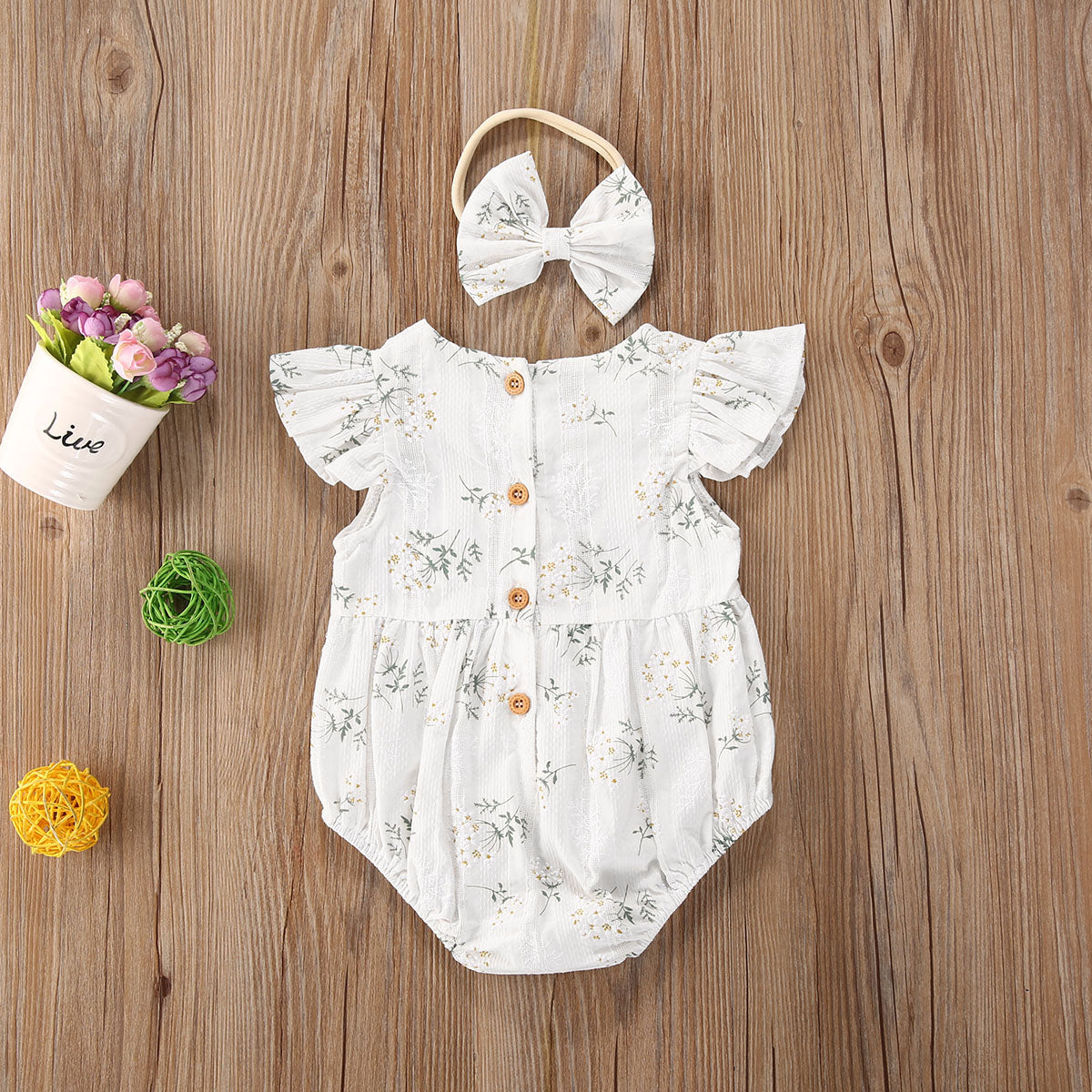 Body de bebé con flores + diadema