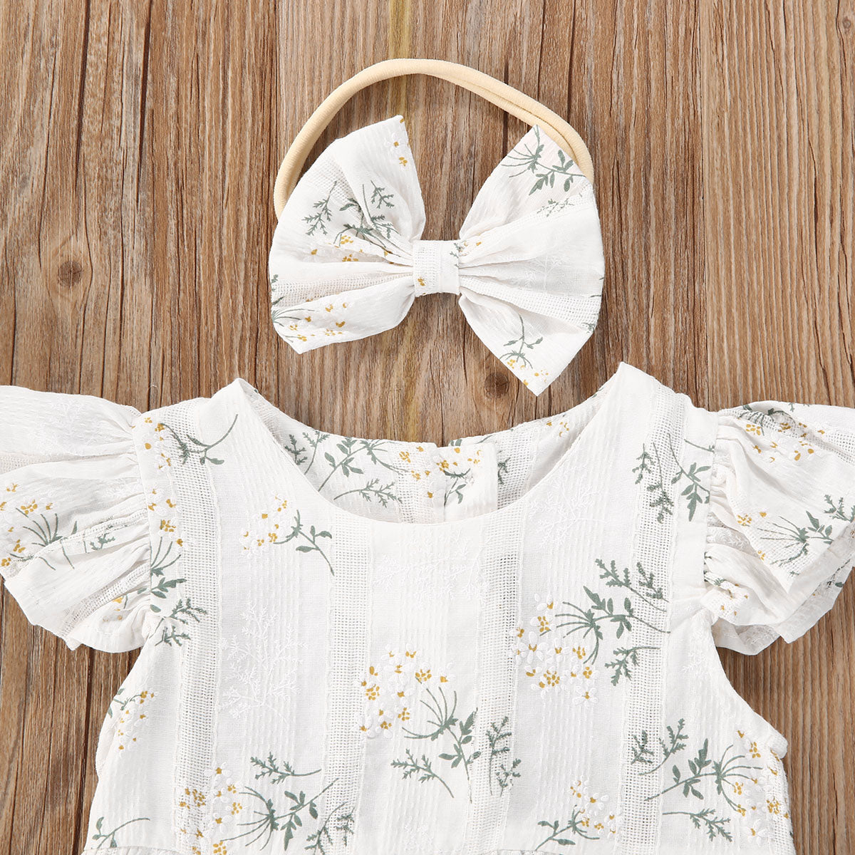 Body de bebé con flores + diadema
