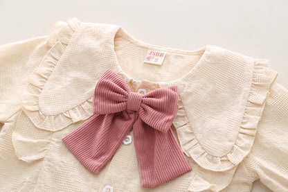 Conjunto infantil de mujer con botones de lazo 
