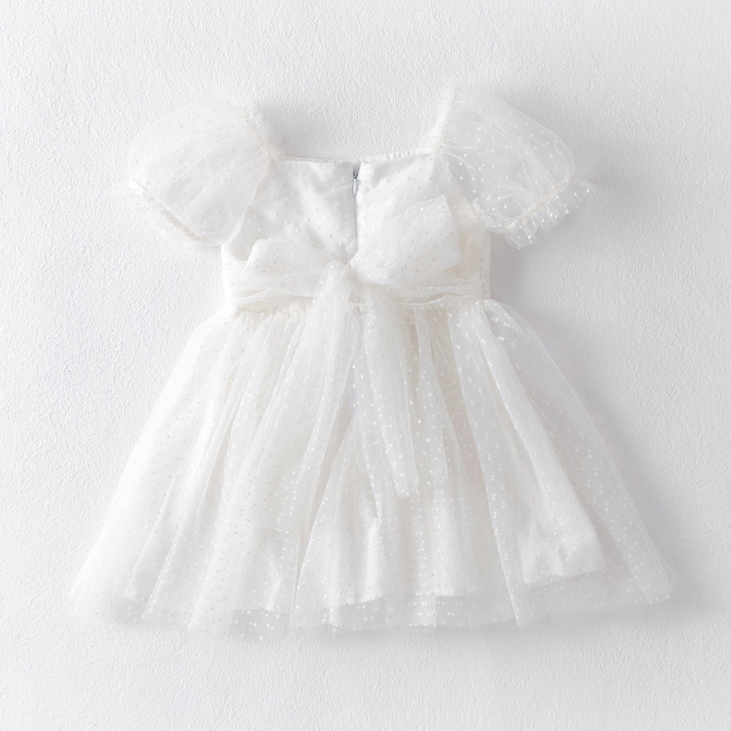 Vestido infantil con lazo de tul y lunares 