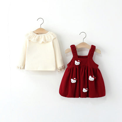Children's blouse and dress with kitten print.
