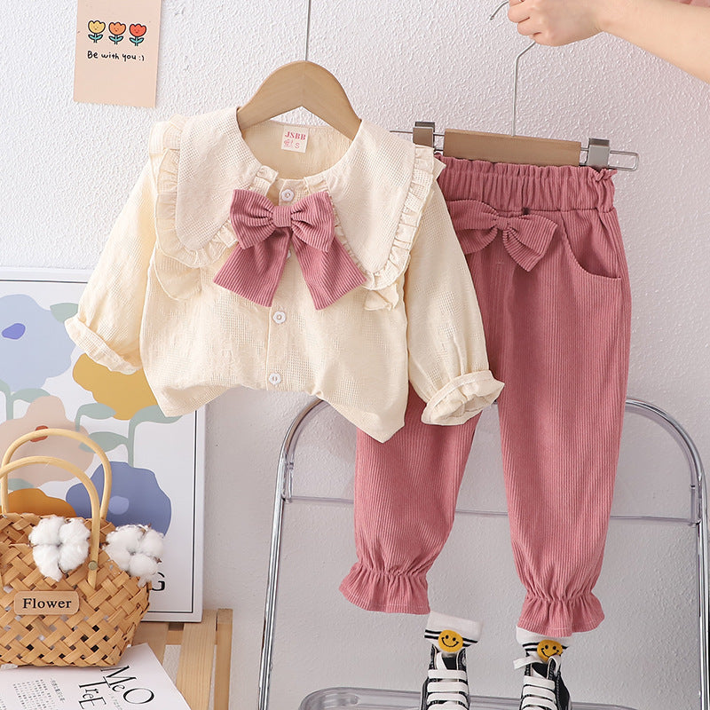 Conjunto infantil de mujer con botones de lazo 