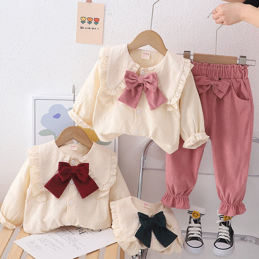 Conjunto infantil de mujer con botones de lazo 