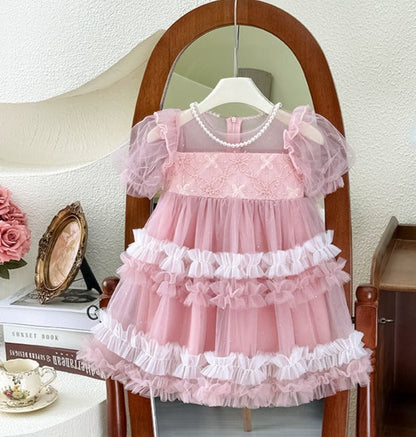 Vestido infantil de tul con perlas y lazo 