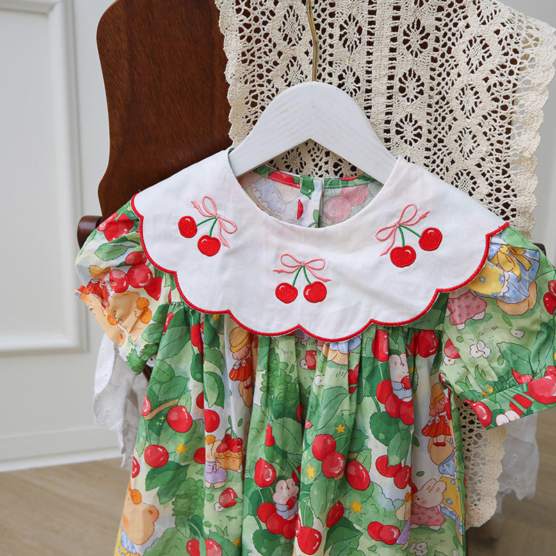 Vestido infantil con cuello de cereza