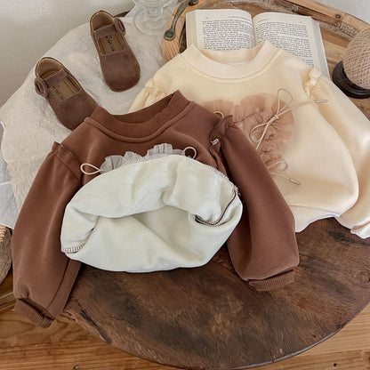 Blusa infantil para mujer con detalle de cordón 