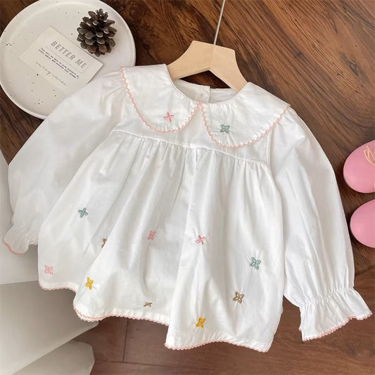 Camisa blanca para bebé niña con estrellas 