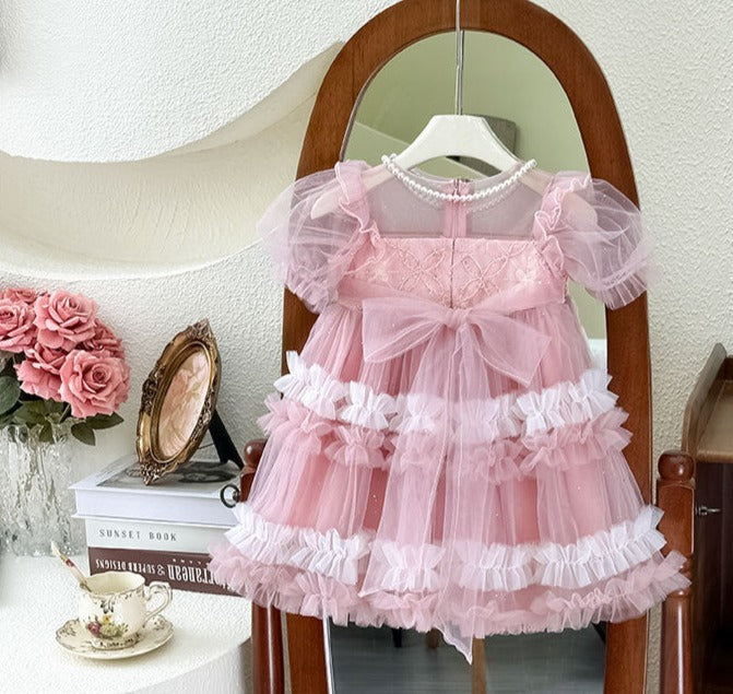 Vestido infantil de tul con perlas y lazo 
