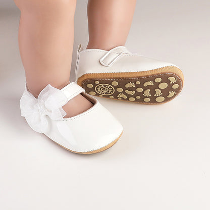 Baby shoe with bow