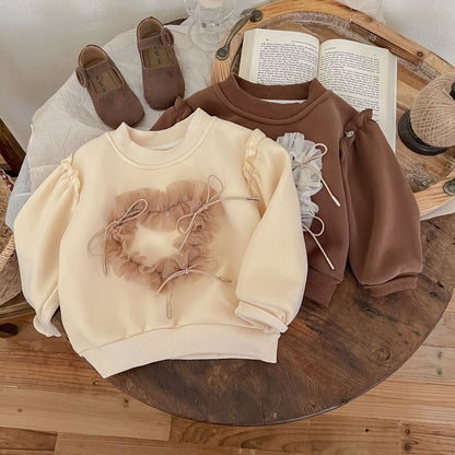 Blusa infantil para mujer con detalle de cordón 