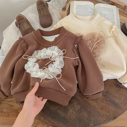 Blusa infantil para mujer con detalle de cordón 
