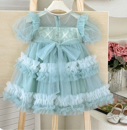 Vestido infantil de tul con perlas y lazo 