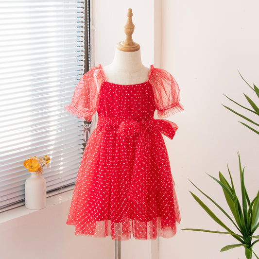 Vestido infantil con lazo de tul y lunares 