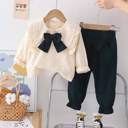 Conjunto infantil de mujer con botones de lazo 